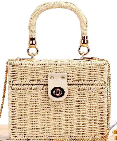 Woven handbag with a gold handle and chain strap on a white background