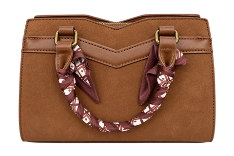 **Alt Text:** Brown structured handbag with double handles, gold-tone hardware, and decorative patterned scarf-wrapped handles, featuring a zippered top and stitched detailing against a white background.